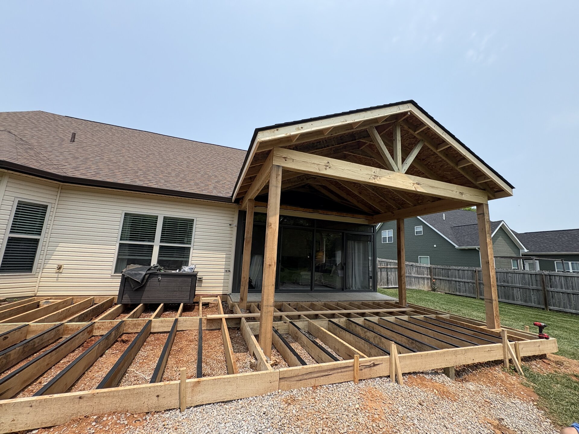 Covered Patio Roof Construction in Vine Grove, KY by RenovateX LLC