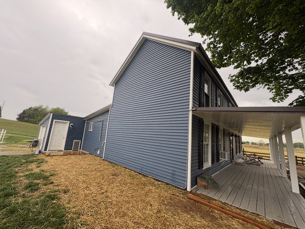 Navy Vinyl Siding Transformation in Radcliff, KY by RenovateX LLC