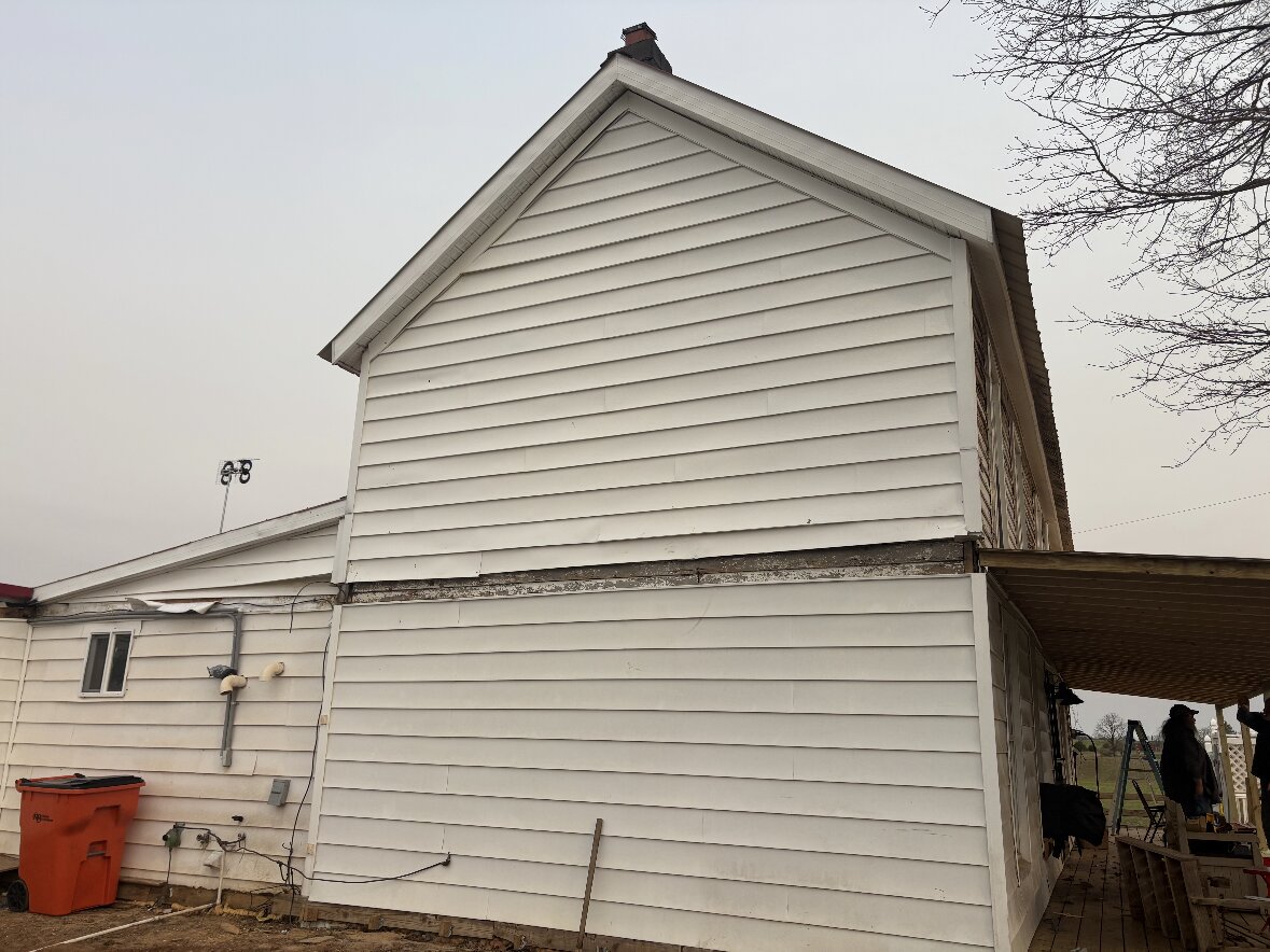 Navy Vinyl Siding Transformation in Radcliff, KY by RenovateX LLC