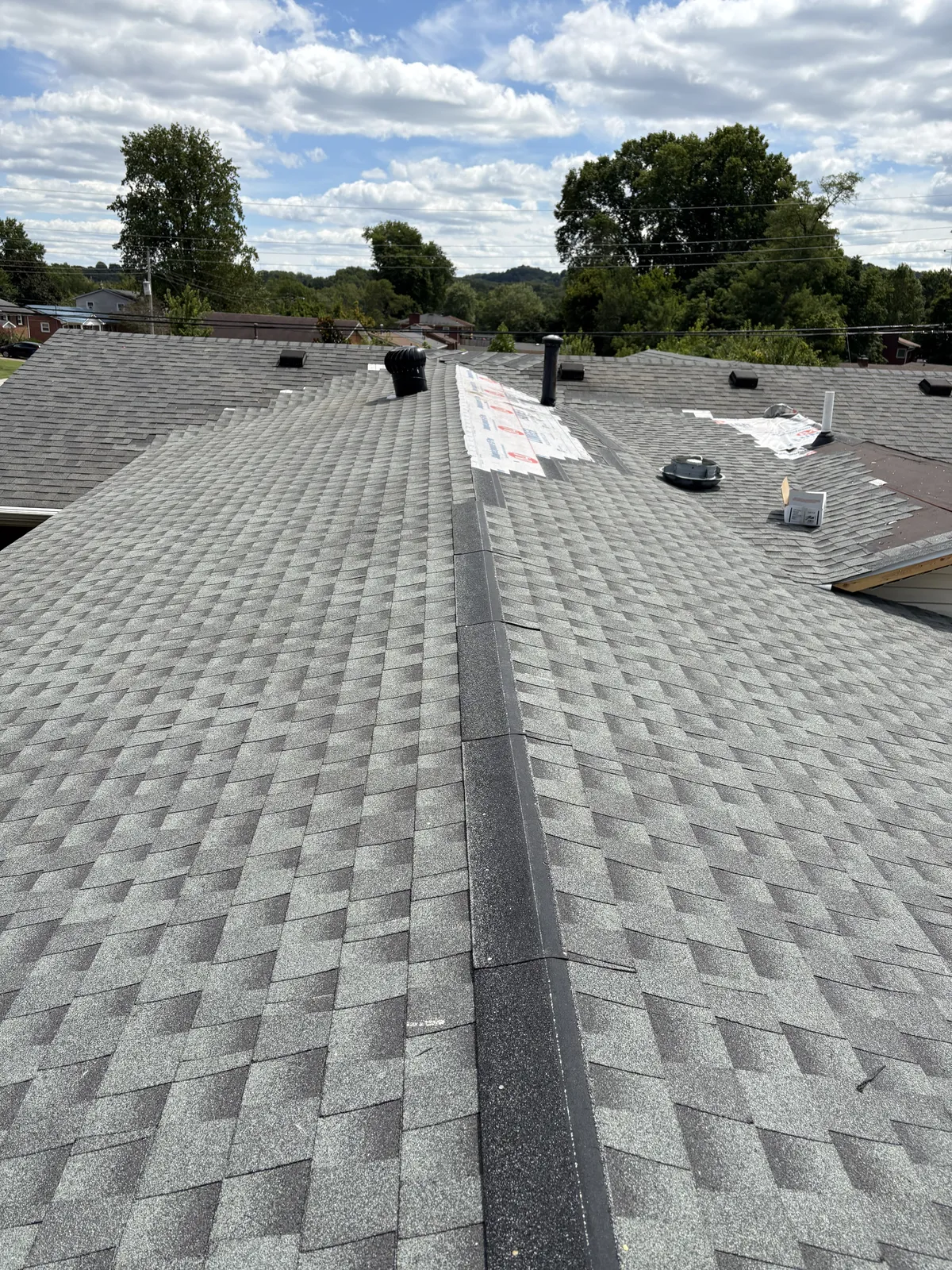 Shingle installation in progress on an Elizabethtown, KY roof replacement by RenovateX LLC